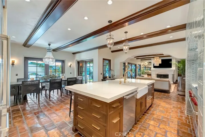 Recent kitchen remodel with dual fuel, 6 burner and grill stove, subzero fridge and separate fridge drawers, solid brass handles, and tile perfection.
