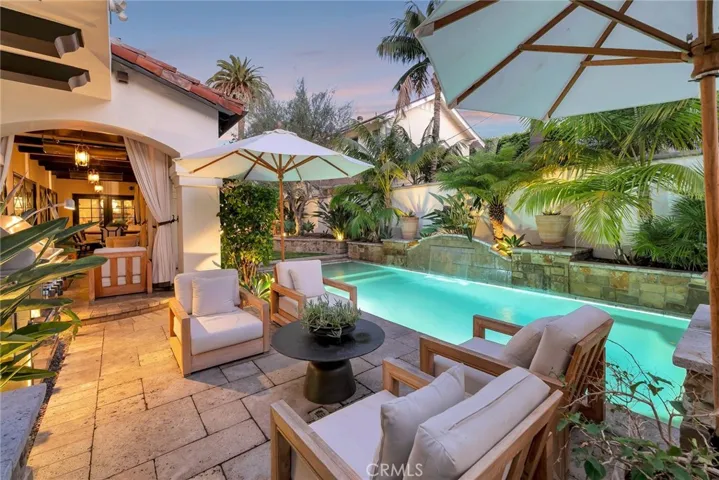 Salt Water pool and spa, the infinity Spa spilling over in the pool, along with other water features create the perfect ambience of tranquility at night, and a family vibe all day all year.