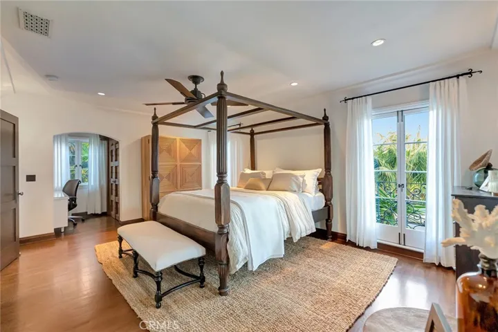 Original Primary en-suite on 2nd floor conforms to a gracious secondary bedroom with office and walk-in Closet and doors to front balcony