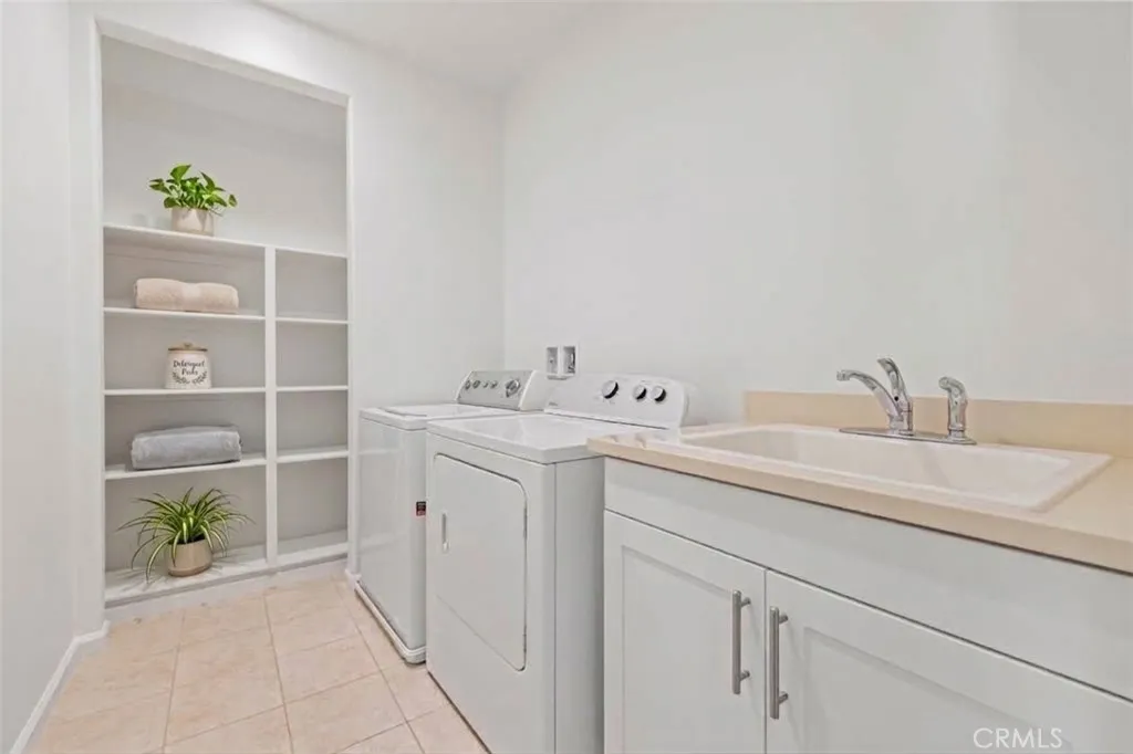 laundry room with storage (virtual staged) laundry room with storage (virtual staged)