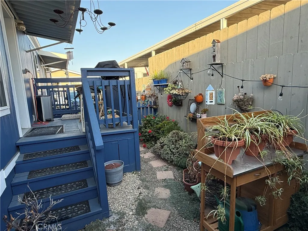 Back fenced garden area and deck