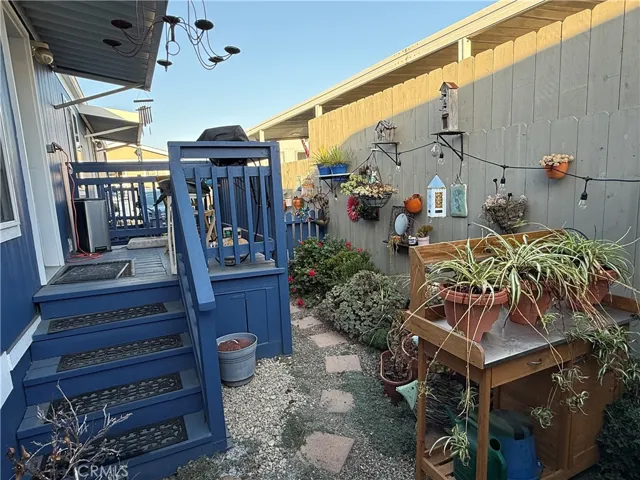 Back fenced garden area and deck