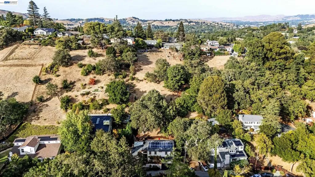 Land behind the home is fenced