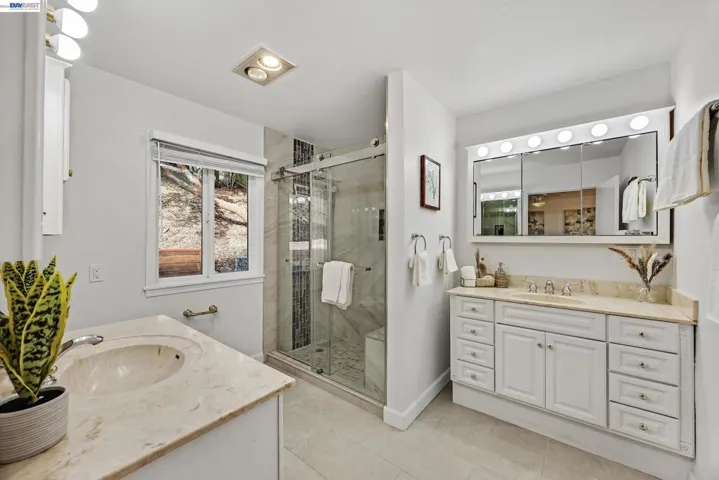 Updated 2024 Main Bedroom Bathroom with Shower seat.