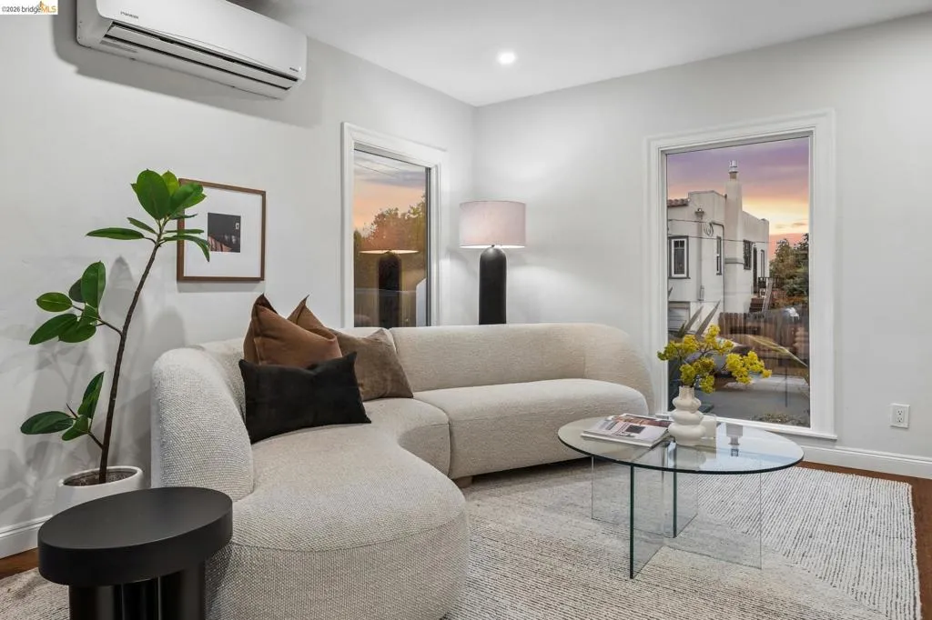 Recessed lighting, wood-finish flooring, and white trim Recessed lighting, wood-finish flooring, and white trim