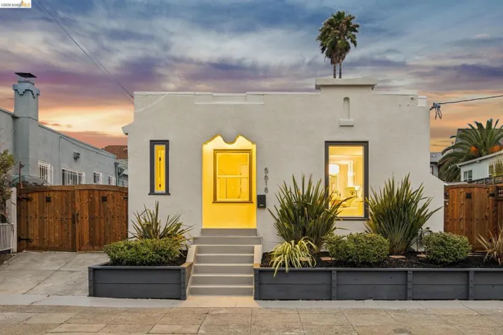 Stucco exterior with prominent entryway