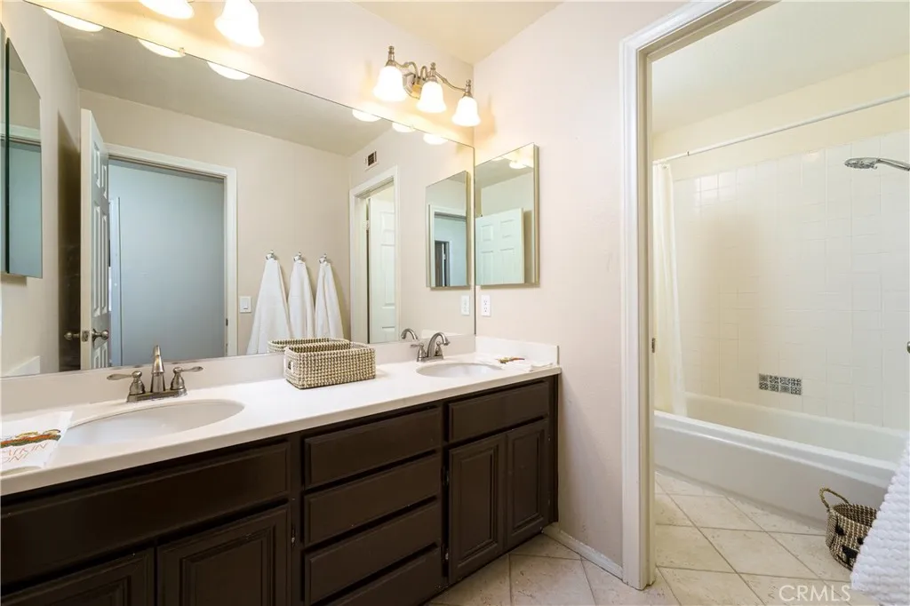 The upstairs hall bathroom is really large too! Double sinks and separate room for commode and tub/shower with a window. The upstairs hall bathroom is really large too! Double sinks and separate room for commode and tub/shower with a window.