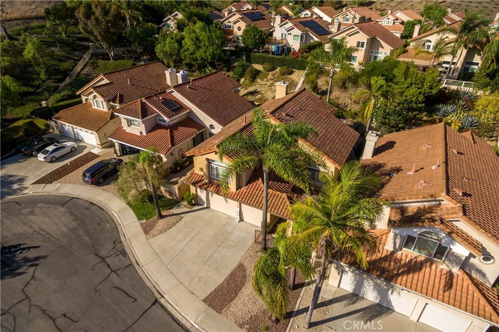 This 5 bedroom home offers a huge gated courtyard in front with brick edges and pavers. Currently low maintenance rock scape in front with tall palm trees.
This 5 bedroom home offers a huge gated courtyard in front with brick edges and pavers. Currently low maintenance rock scape in front with tall palm trees.