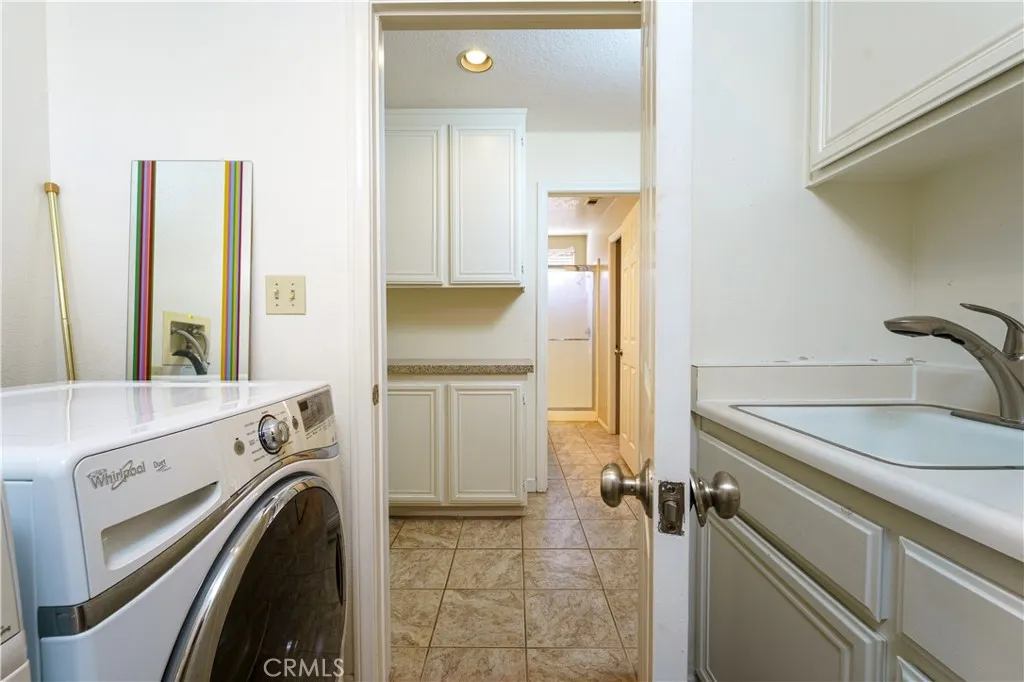 Laundry room with a cute window too. Laundry room with a cute window too.
