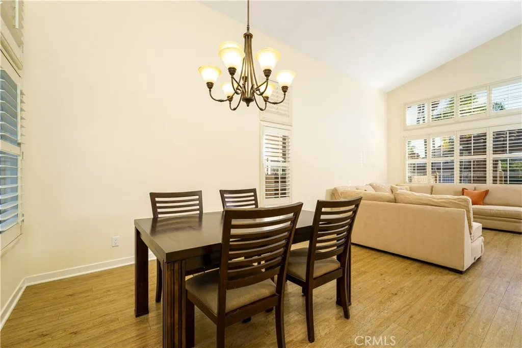 Large formal dining area between the living room and kitchen. Great high ceilings and tons of natural light all day! Large formal dining area between the living room and kitchen. Great high ceilings and tons of natural light all day!
