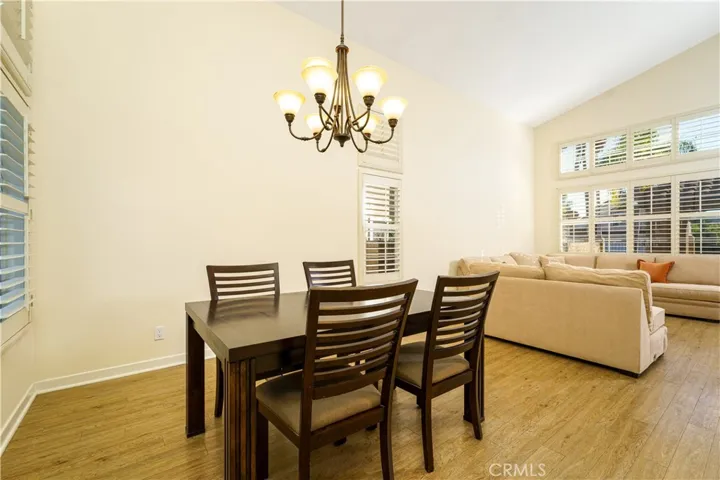 Large formal dining area between the living room and kitchen. Great high ceilings and tons of natural light all day!
