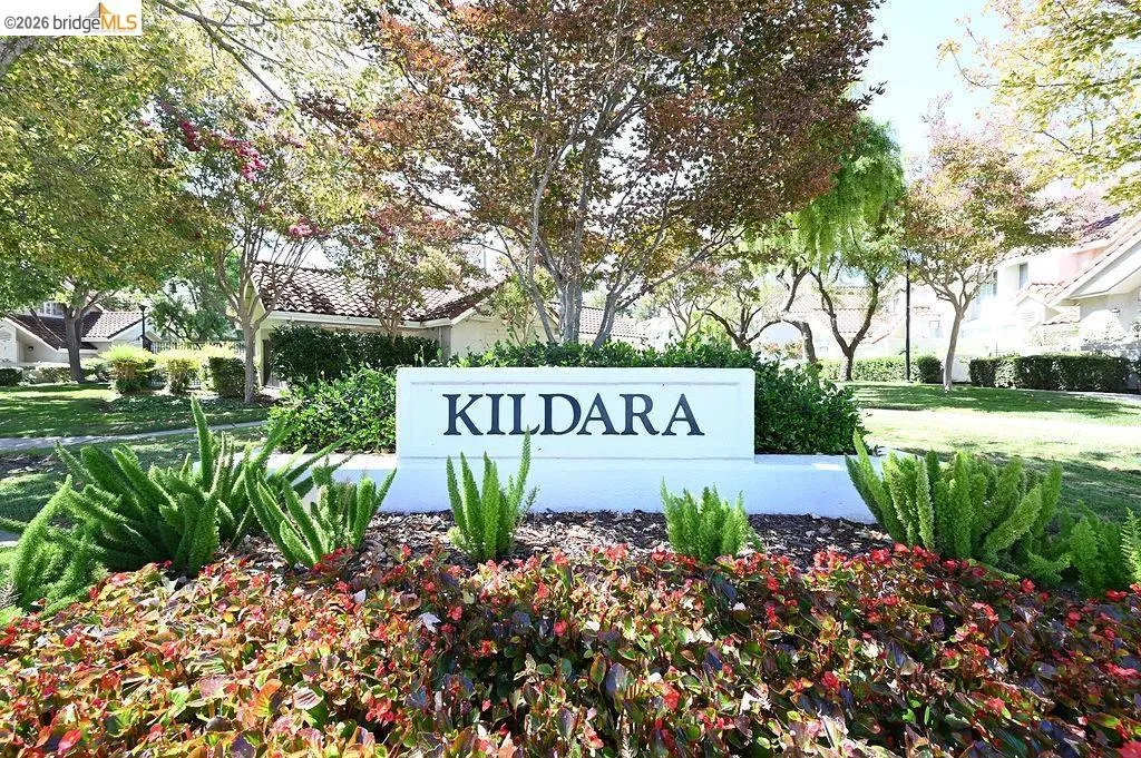 Community entrance signage featuring "KILDARA" with surrounding landscaping