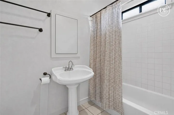 Photo digitally altered, tenant's personal items removed from photo.