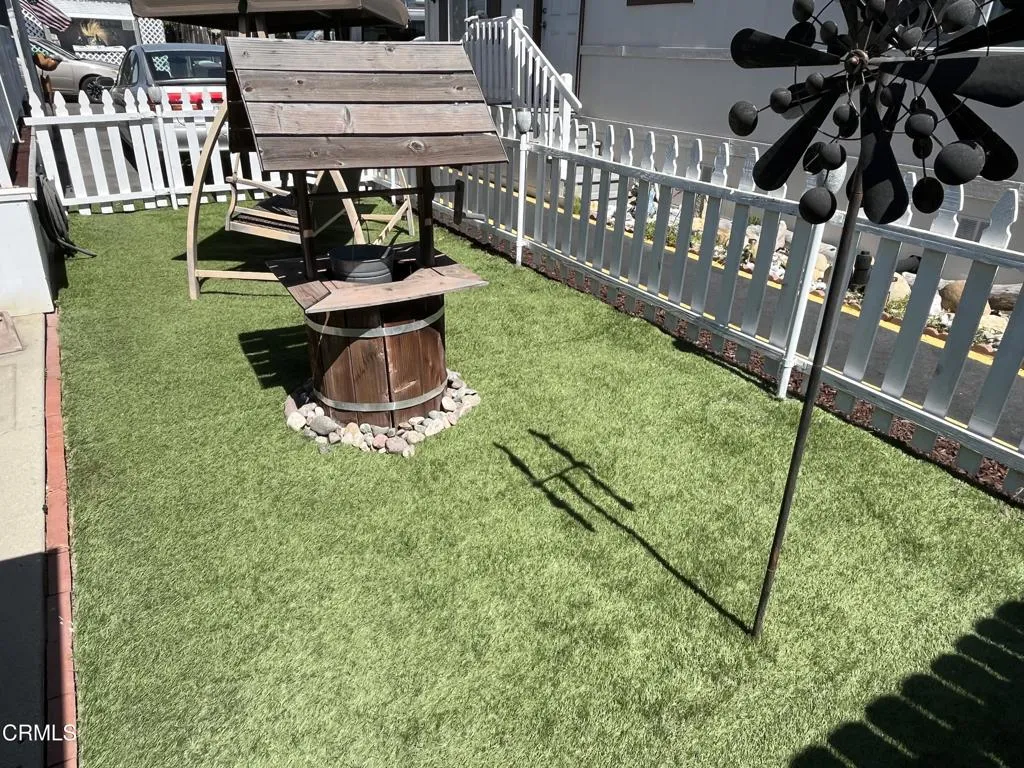 Yard with wishing well Yard with wishing well