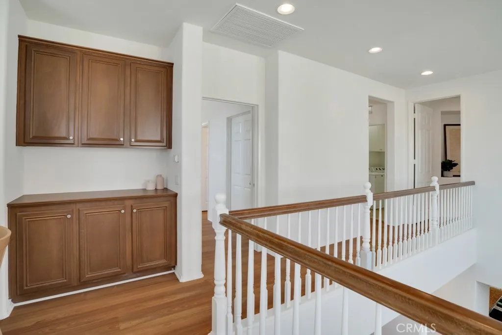 Upstairs Hallway With Linen Cabinets