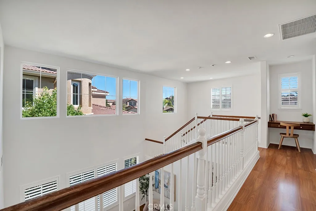 Upstairs Hallway With Desk Area