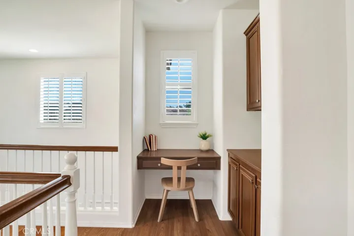 Upstairs Hallway With Desk Area