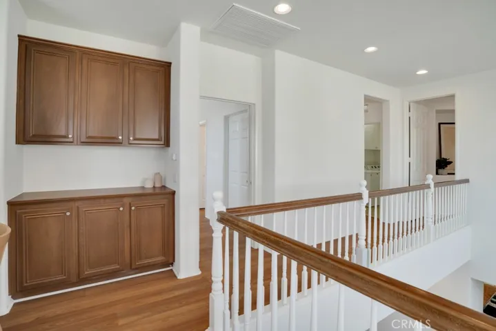 Upstairs Hallway With Linen Cabinets