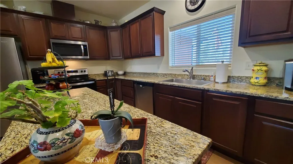 View of spotless kitchen with ample counter space & tons of cupboards. View of spotless kitchen with ample counter space & tons of cupboards.