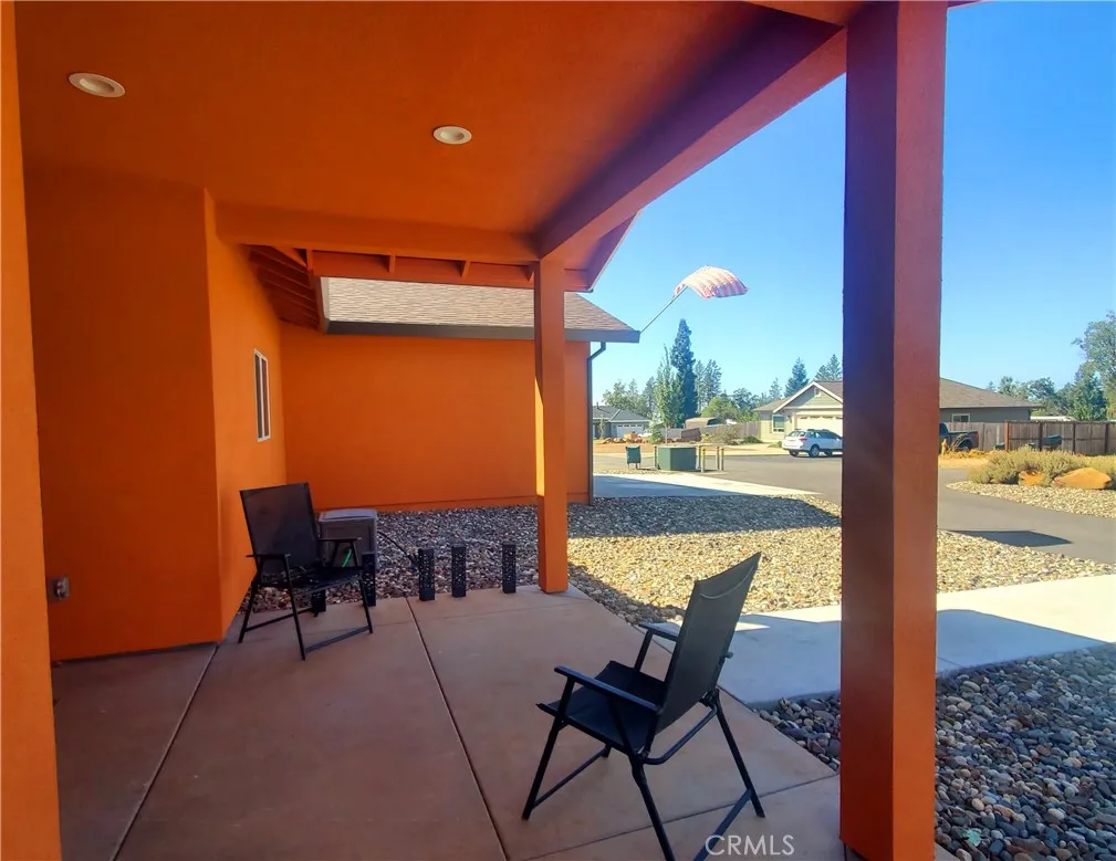 View of covered front patio area. View of covered front patio area.