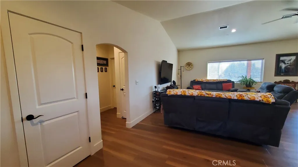View from entry of arched hallway leading to private guest bedroom & guest bathroom. View from entry of arched hallway leading to private guest bedroom & guest bathroom.