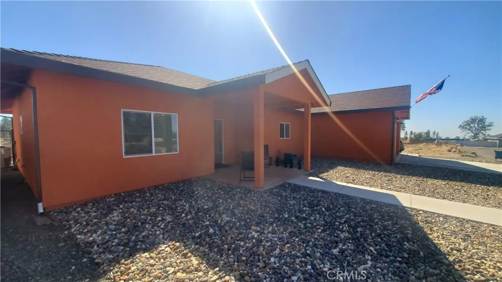 Front view with covered front porch and concrete sidewalk leading to circle driveway. Front view with covered front porch and concrete sidewalk leading to circle driveway.