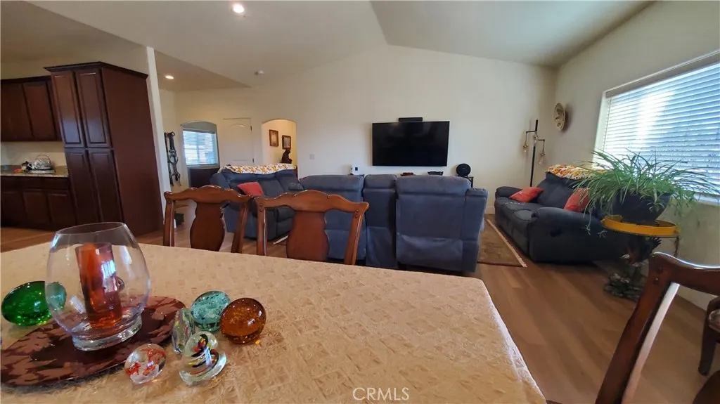 View from dining area overlooking living room. View from dining area overlooking living room.