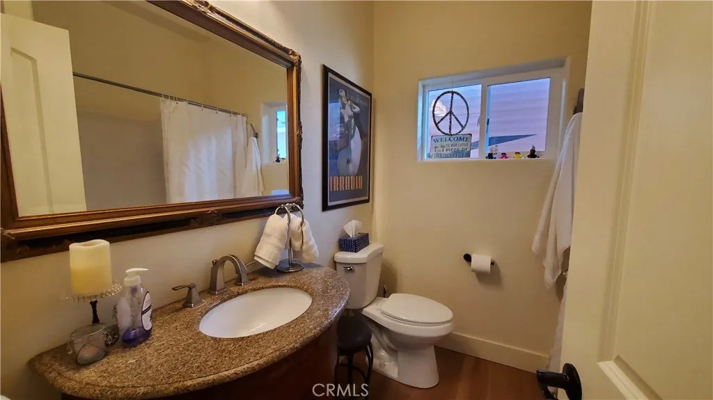 View of privately situated guest bathroom. View of privately situated guest bathroom.
