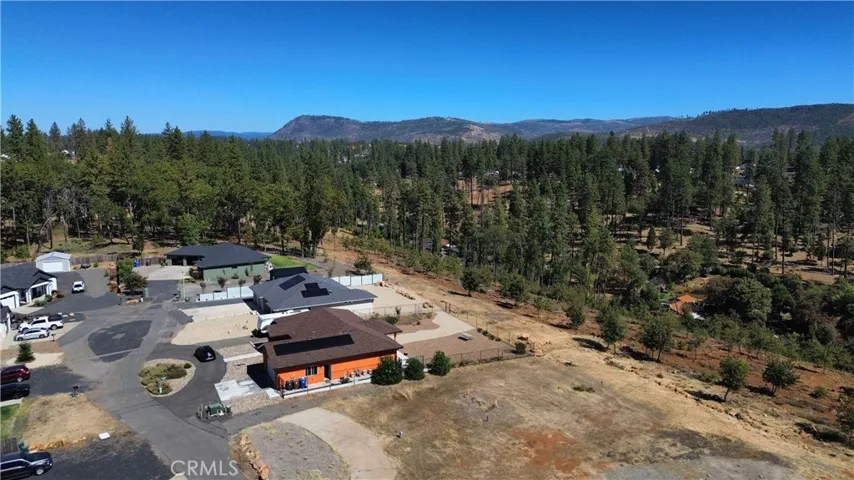 View of 1724 Ellis Drive with Sawmill Peak to the North.