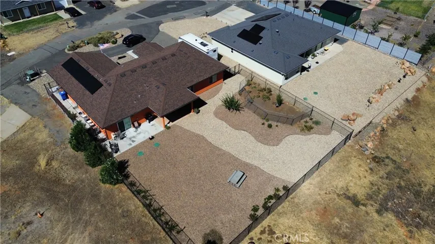 Aerial View of 1724 Ellis Drive with immaculate, landscaped yard.