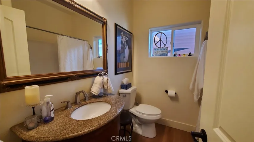 View of privately situated guest bathroom.