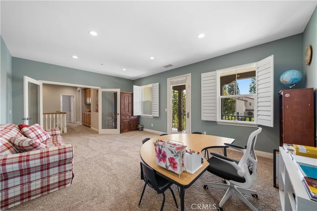Upstairs bonus room with balcony access