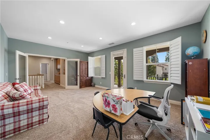 Upstairs bonus room with balcony access