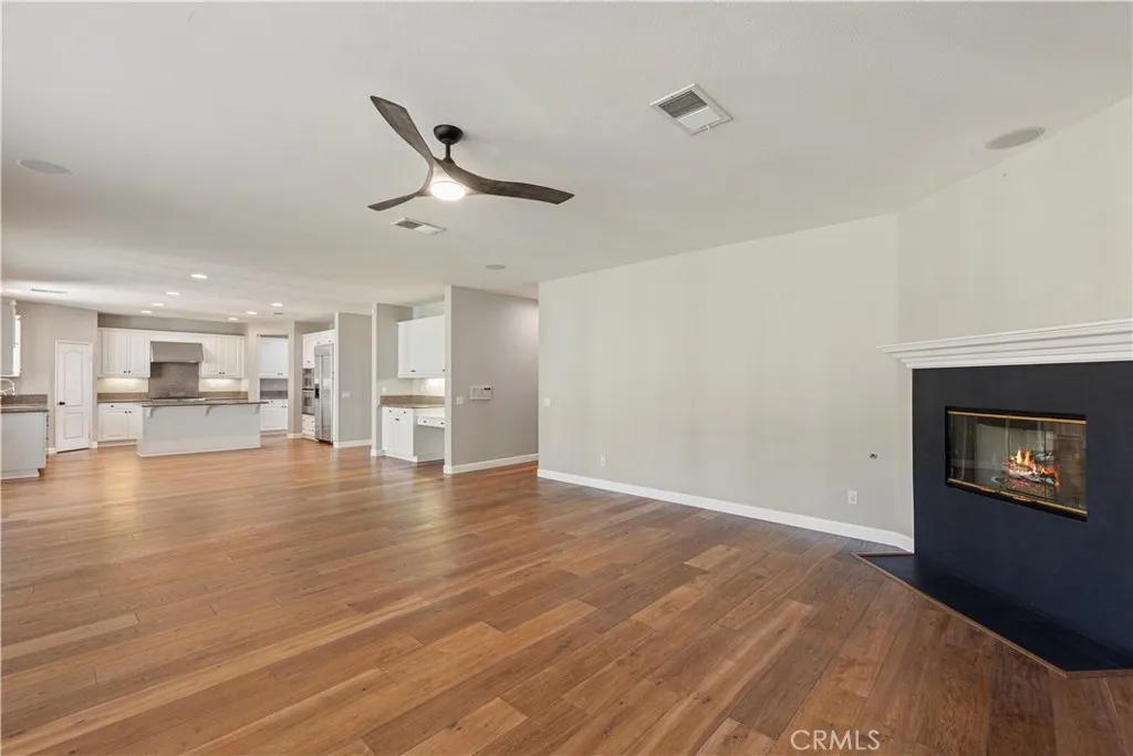 Large open-concept family room connects with kitchen. Large open-concept family room connects with kitchen.