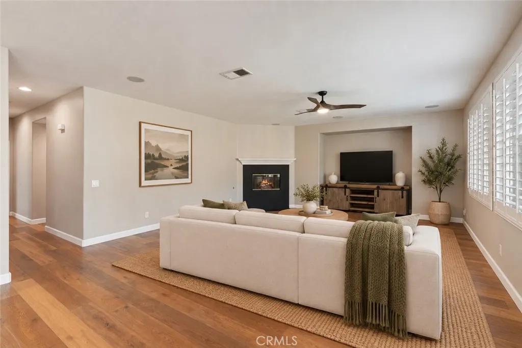 Virtual stage. Family room w/fireplace and media niche. Virtual stage. Family room w/fireplace and media niche.