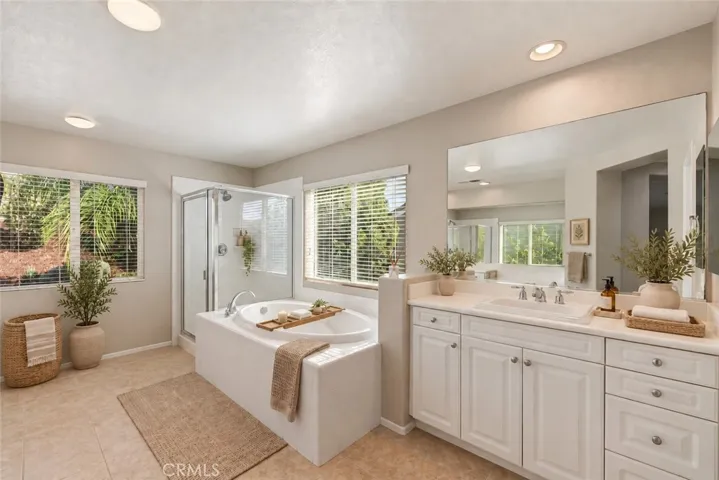 Virtual stage. Upstairs Primary Ensuite Bathroom #2.