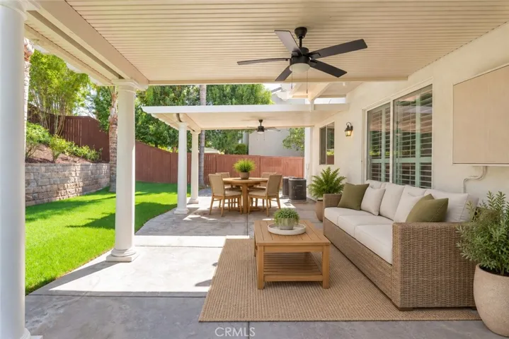 Virtual stage. Dual covered patio w/ceiling fans.