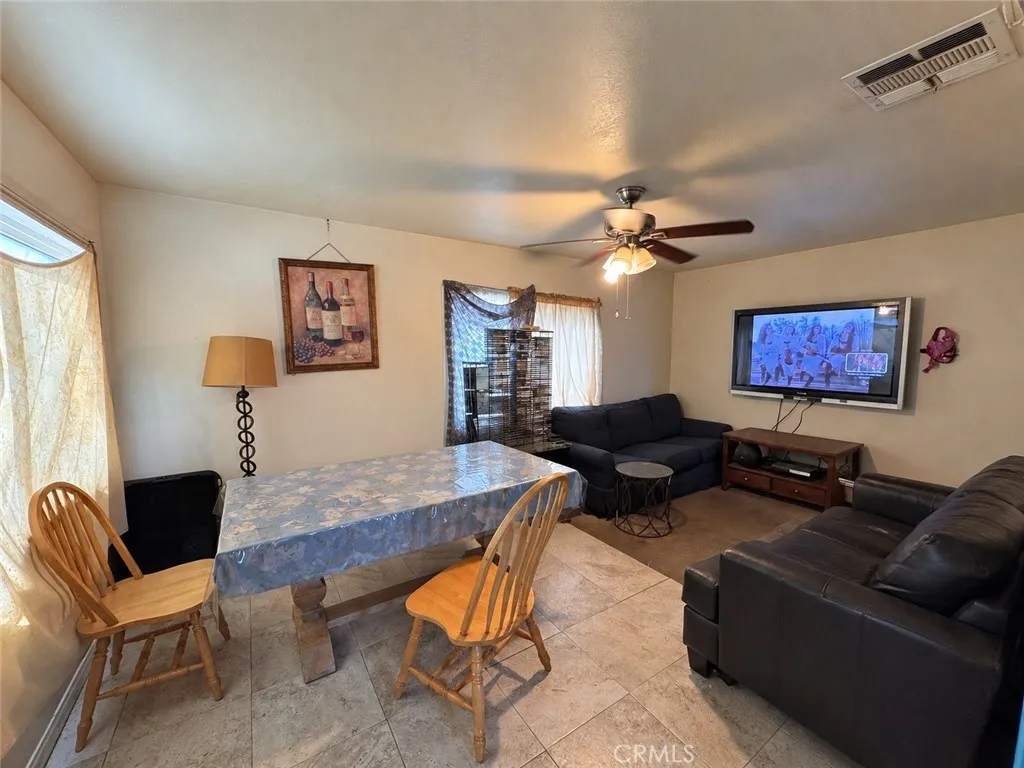 Living room- AI enhanced to remove personal items Living room- AI enhanced to remove personal items