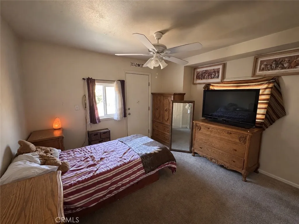 Primary Bedroom- AI enhanced to remove personal items Primary Bedroom- AI enhanced to remove personal items