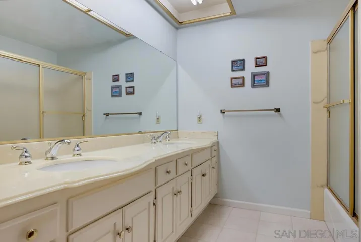 Guest bathroom upstairs with tub and shower