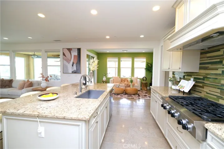 Functional kitchen layout with a central island and an easy connection to adjacent living spaces.