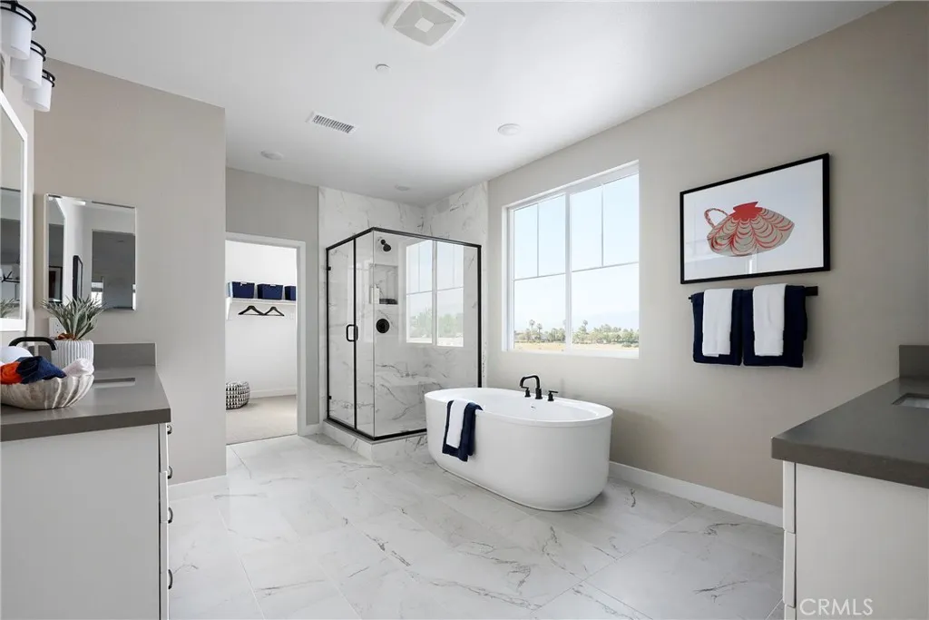 Model Photos: Photos shown are of the model home for this floor plan. Actual finishes, features, and landscaping may vary.