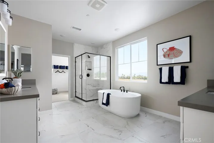Model Photos: Photos shown are of the model home for this floor plan. Actual finishes, features, and landscaping may vary.
