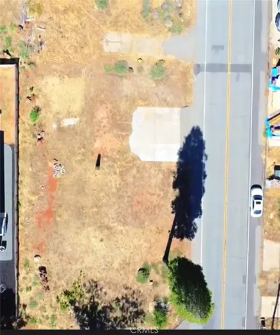 Aerial view of the lot as well as Road.