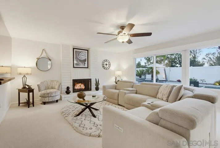 Big family room with another cozy fireplace!