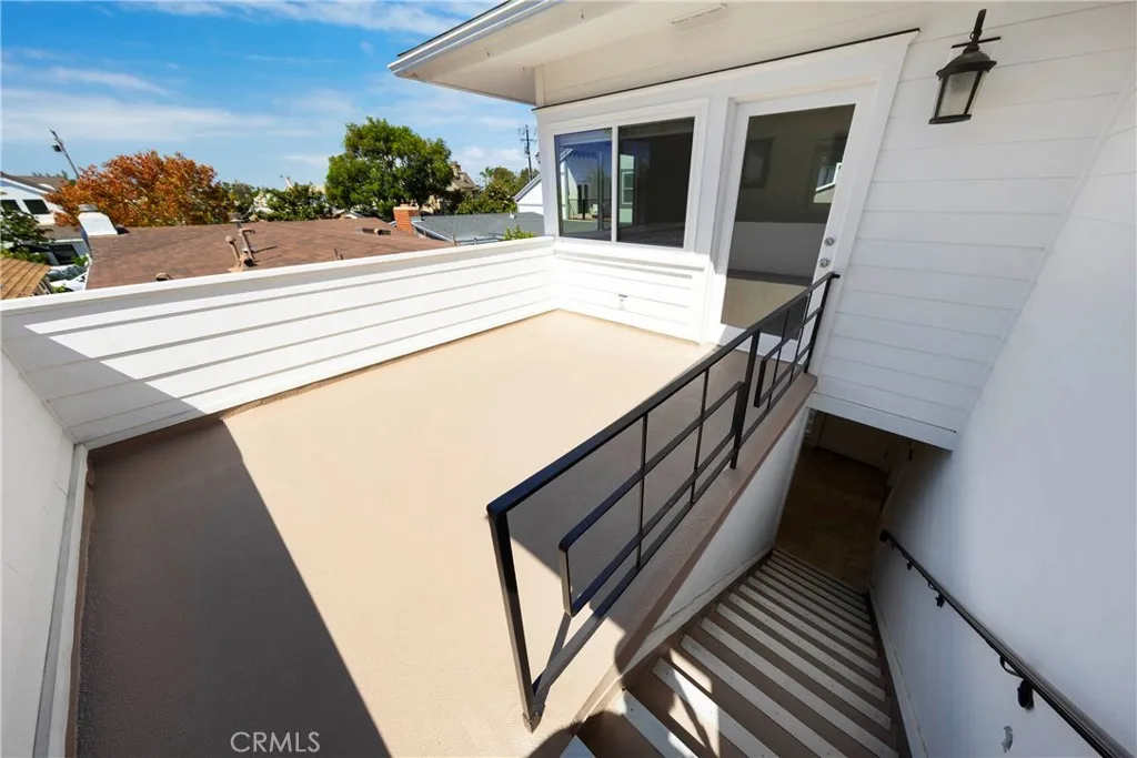 Private deck leading to 412.5 Dahlia Ave.