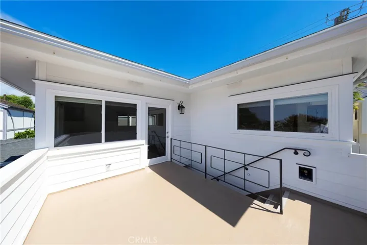 Private deck leading to 412.5 Dahlia Ave.