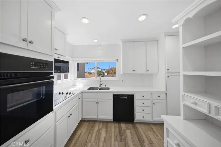 Enjoy refreshing deck and peekaboo views from your kitchen.
