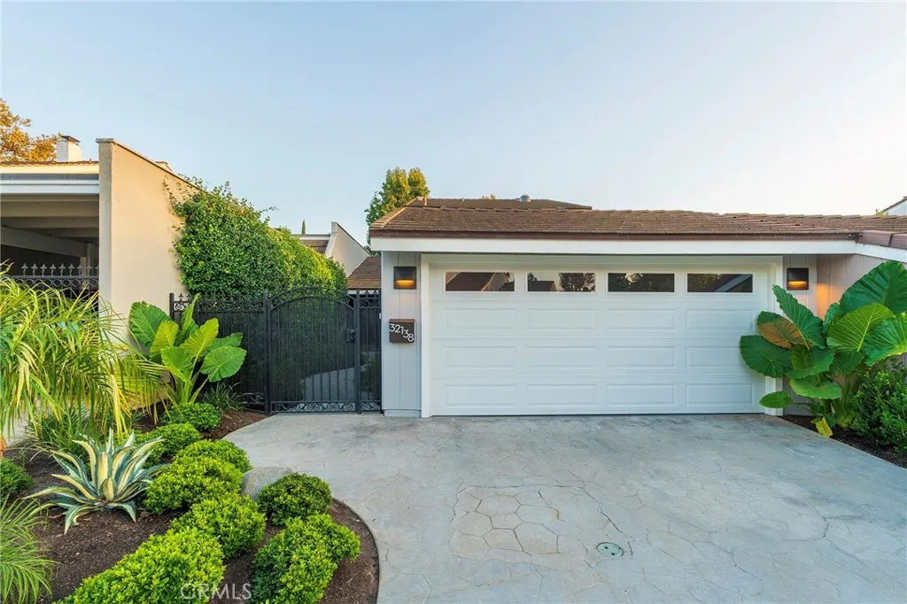 Front view, new garage door, paint & landscaping Front view, new garage door, paint & landscaping