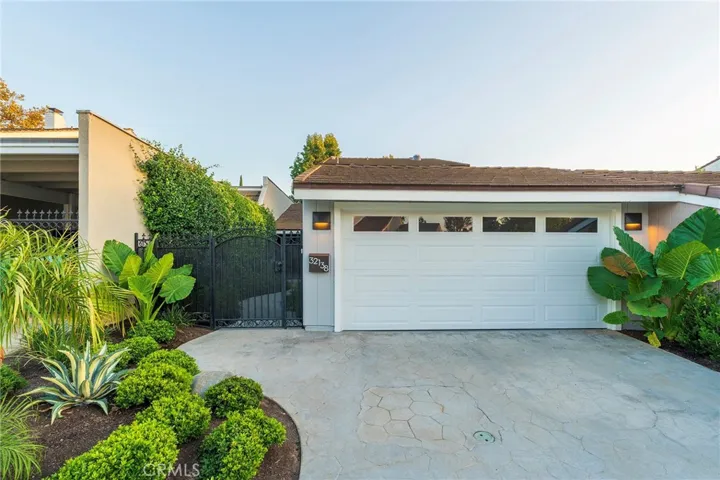 Front view, new garage door, paint & landscaping